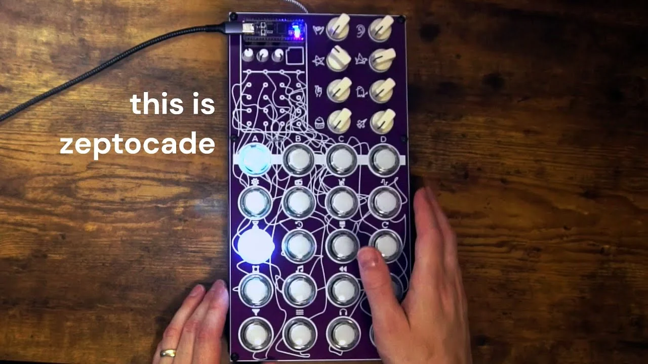The Zeptocade arcade control surface with twenty illuminated buttons and eleven knobs