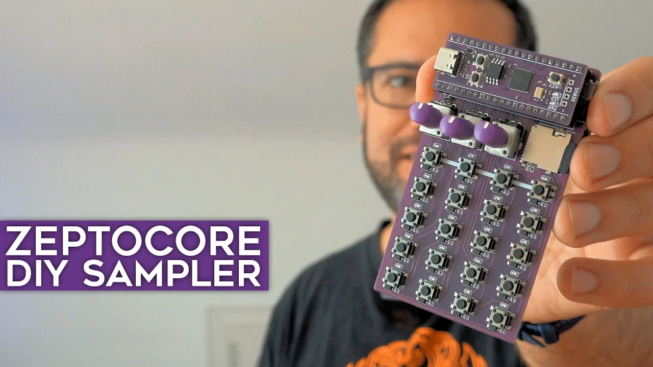 Floyd Steinberg holding a repaired DIY Zeptocore circuit board