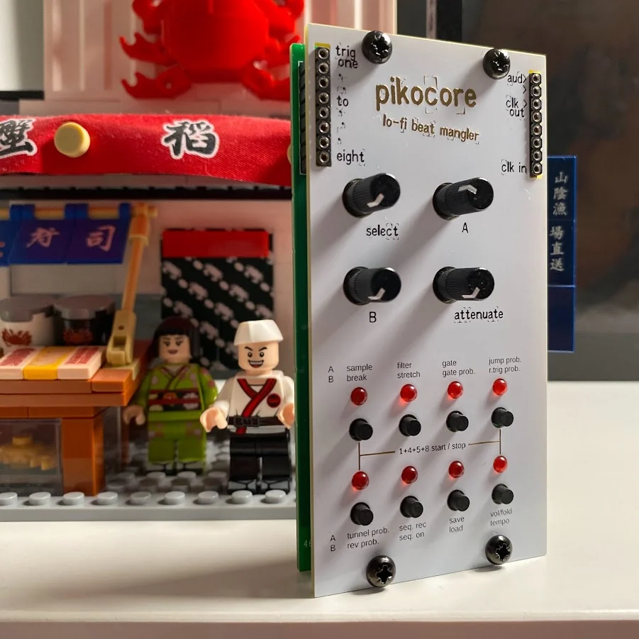 Faux Cyrillic's white Pikocore panel installed vertically in an AE Modular synthesizer