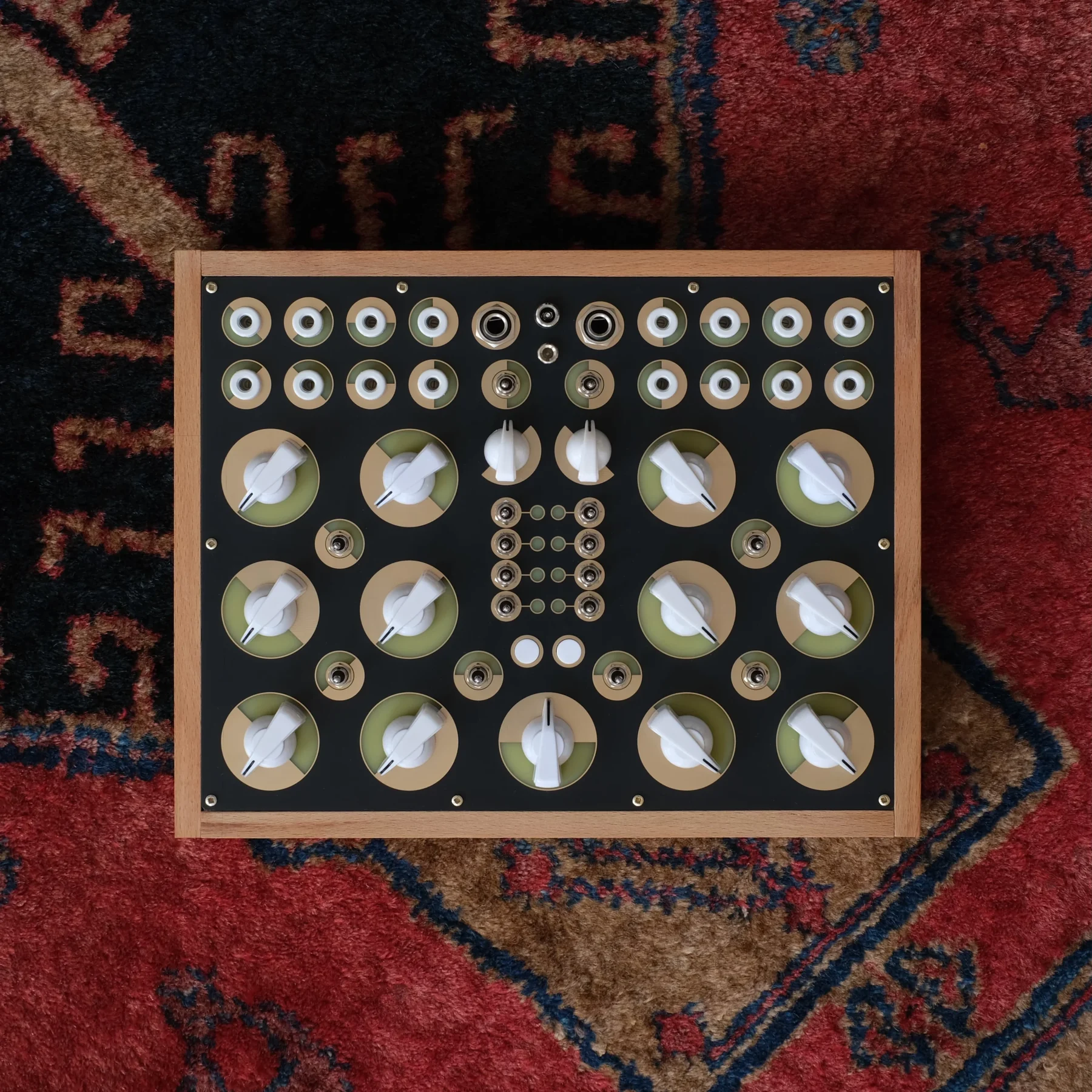 The Tilde Instruments Röntgen analog improvisational synthesizer in a wooden case
