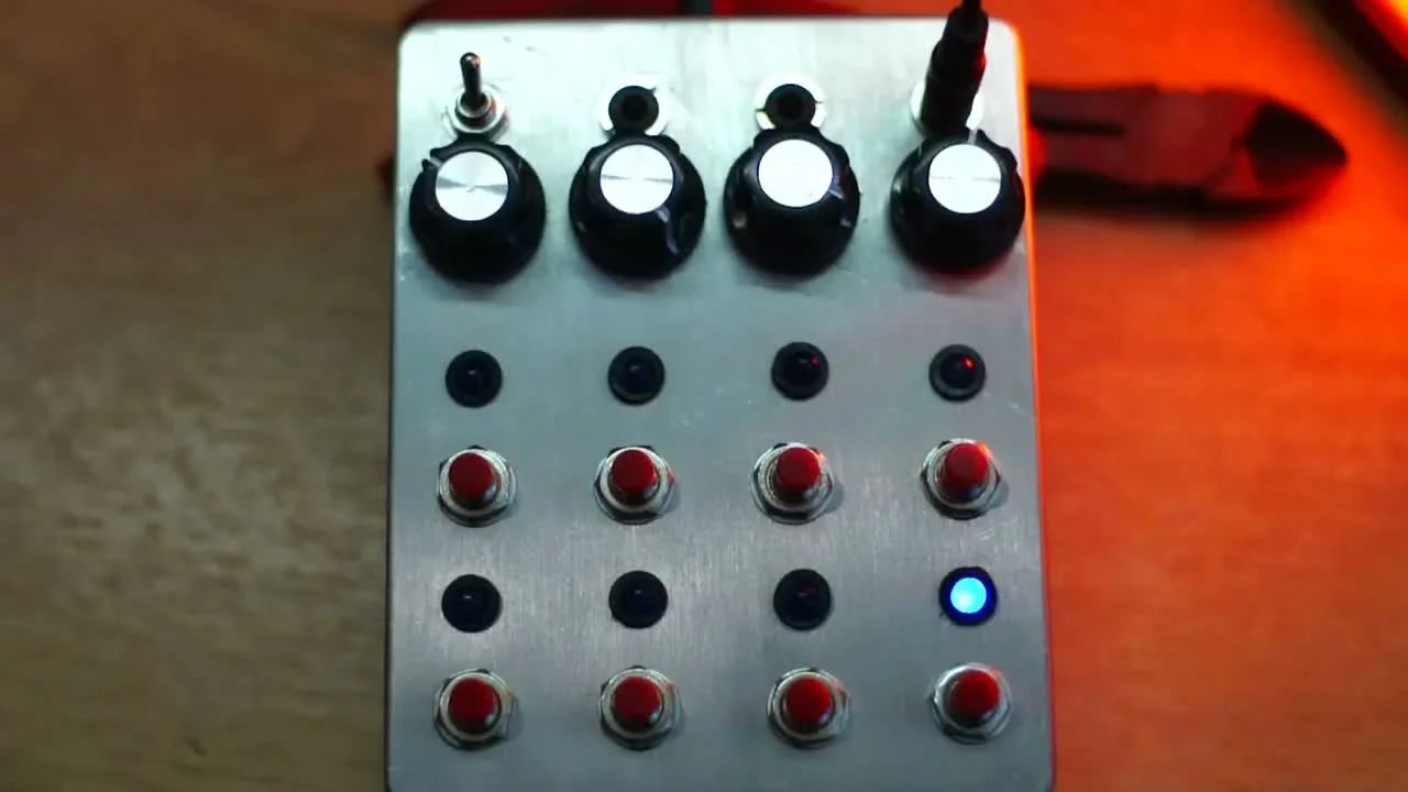 Хрустэффект's custom black Pikocore redesign with a colorful front-panel graphic, four knobs, and eight buttons