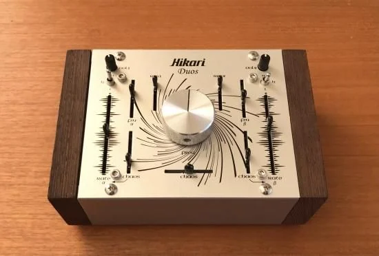 The Hikari Instruments Duos stereo chaos synthesizer in a wooden case